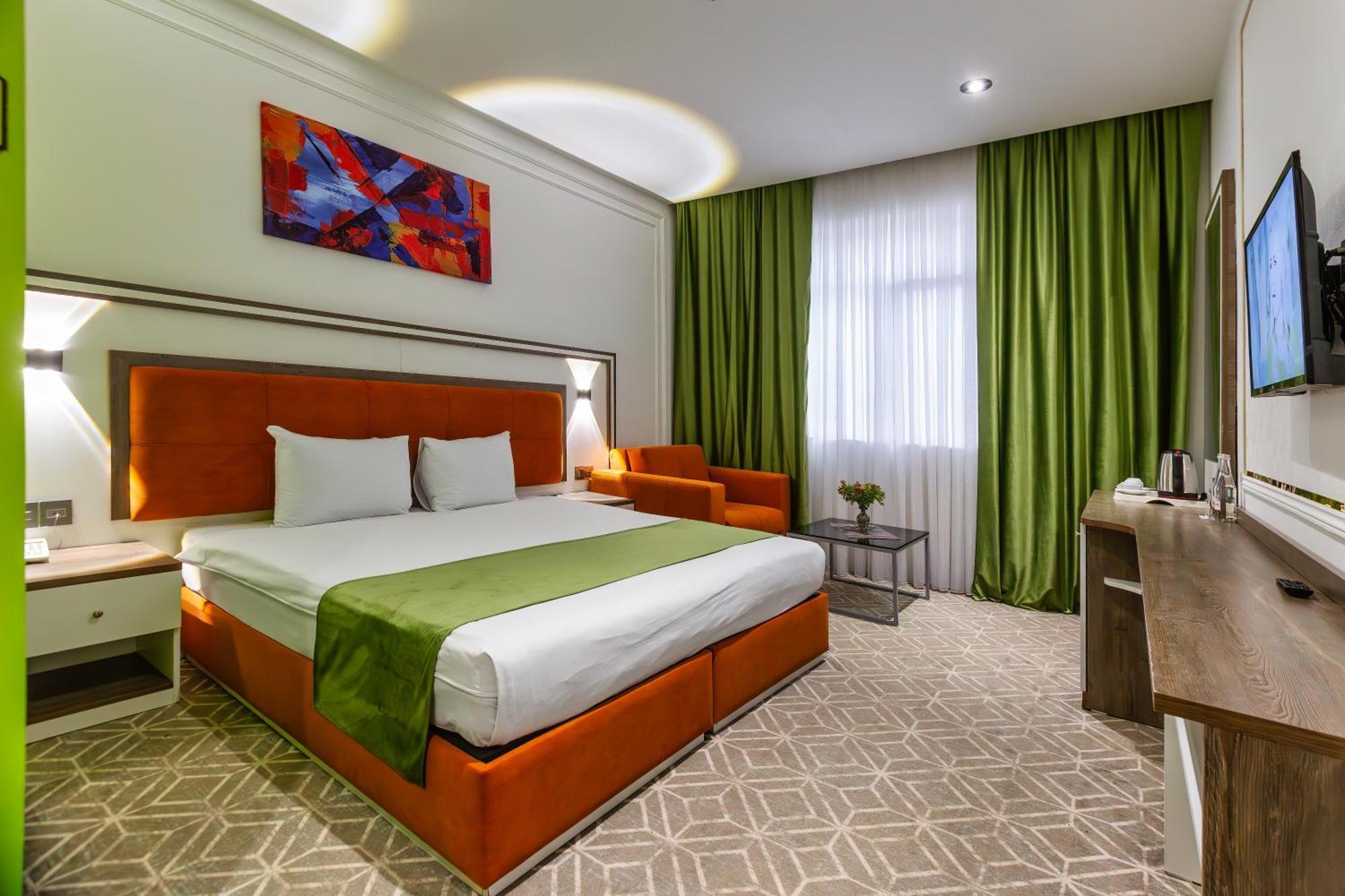 Alba Hotel & Spa Баку Экстерьер фото A room at the hotel